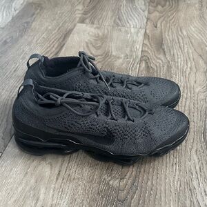 Black Nike Vapormax athletic shoes